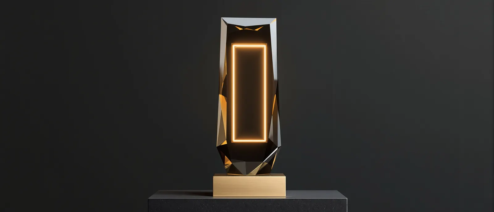A smoked glass and gold websbz trophy with a lit window frame